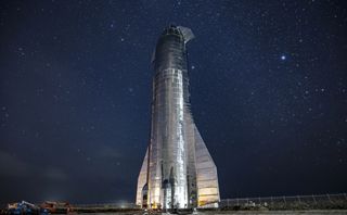 SpaceX's first full-size Starship prototype, the Mk1, stands at the company's build and launch facility in Texas. The Mk1 has since been shelved; SpaceX is currently building another design, called the SN1.