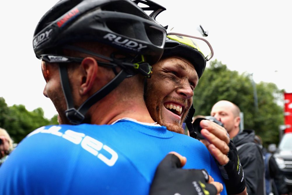 Matteo Trentin celebrates with the other Italian riders