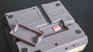 The underside of the NESPi 4 case has a compartment to hold spare micro SD cards