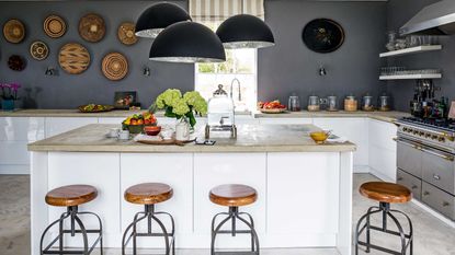 kitchen with charcoal gray walls and island