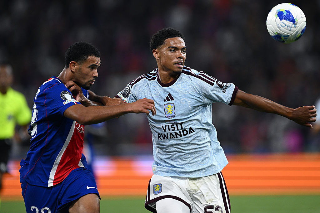 George Hemmings of Aston Villa competes for the ball with Warren Zaire Emery of Paris Saint Germain during the UEFA Super Cup 2026 match