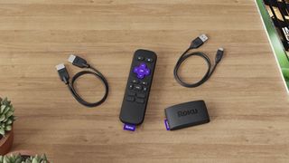 Roku Express side by side with remote and two cables