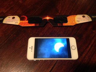 If you want to photograph the sun with your cell phone, consider putting a solar filter over the camera lens to protect the bright image of the sun from becoming burned into the screen.