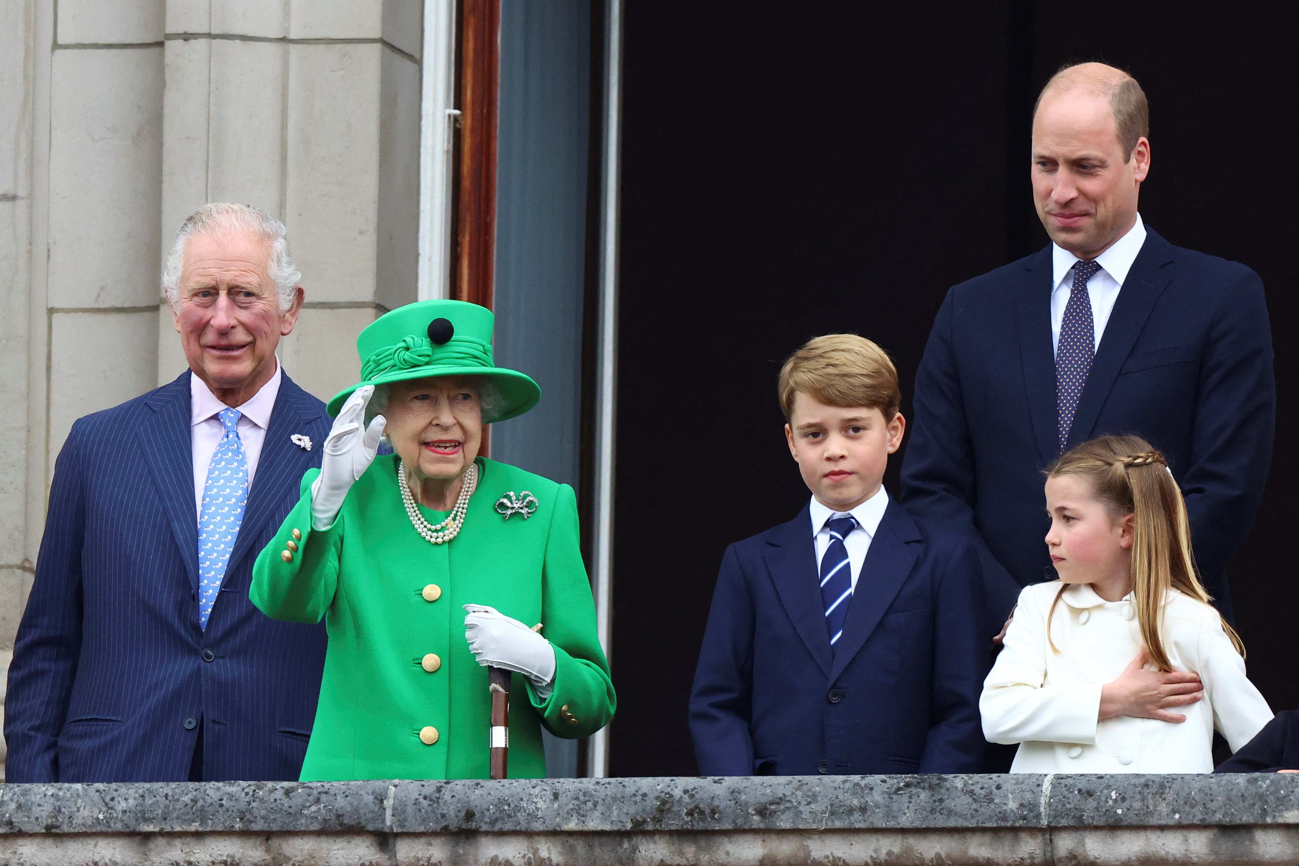 King Charles, Queen Elizabeth, Prince William, Prince George and Princess Charlotte on the balcony during the Queen's Platinum Jubilee.