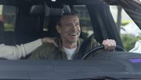 Dr. Seth McDale (Scott Foley) is happy while driving in Will Trent.