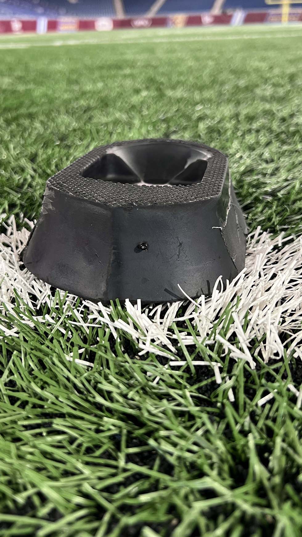 A miked-up kicking tee used to cover UFL games