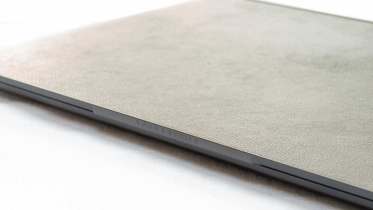 Closeup of the Lenovo Yoga 9i 14in (Shadow Black) logo detail