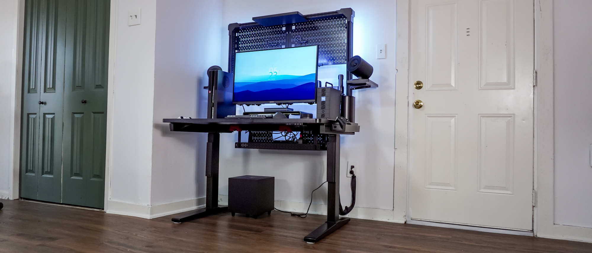 The Corsair Platform 4: Elevate Desk set up in a corner