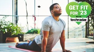 Man doing an upward dog yoga pose