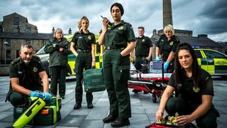Ambulance season 12: a group of paramedics pose outside an ambulance