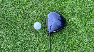Callaway Big Bertha 2023 Driver teed up against a golf ball on the golf course