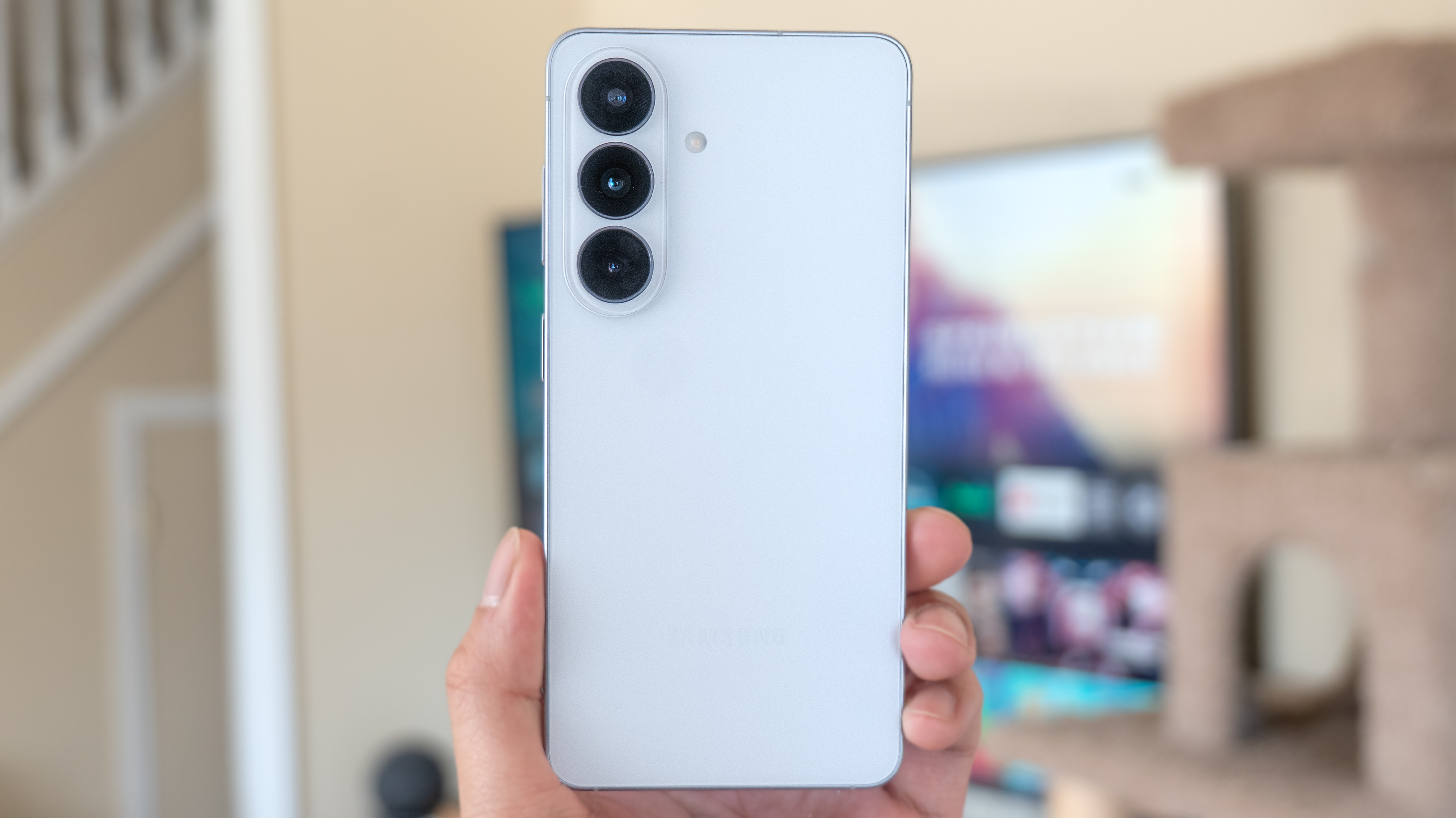 Samsung Galaxy S26 held in the hand.