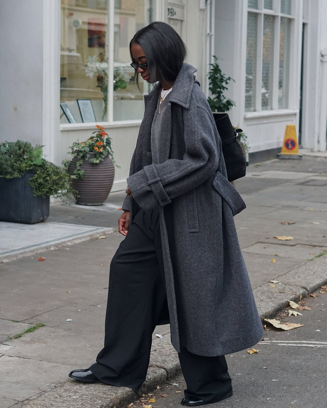 Liv in a grey wool coat