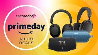 Sony and Sennheiser headphones, Bose and JBL Bluetooth speakers on a pink and yellow gradient background. "TechRadar Prime Day Audio Deals" text is on the left side.
