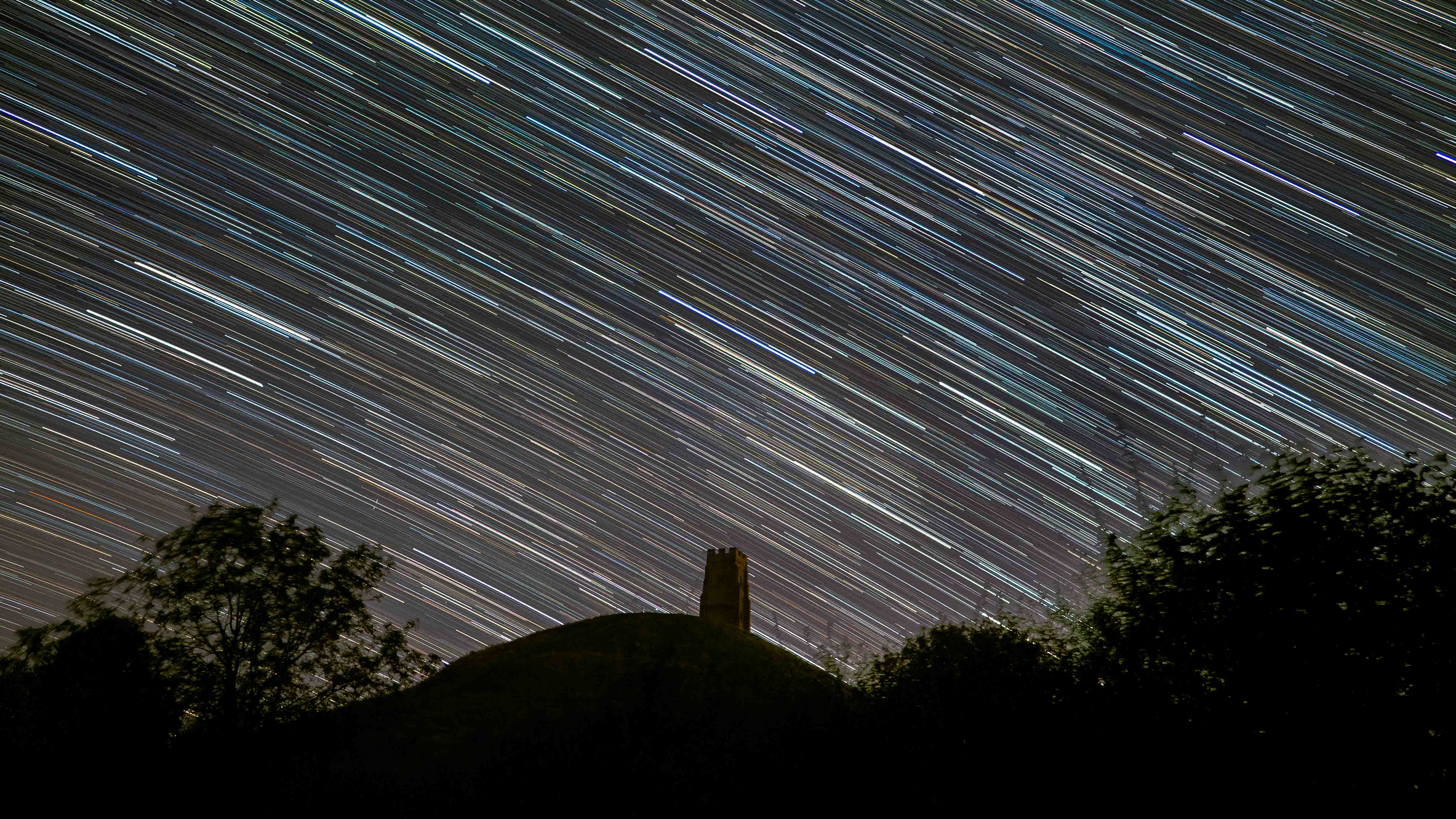 Star trails over Glastonbury Tor