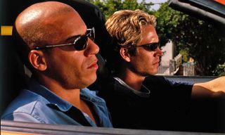 (L to R) Vin Diesel as Dom and Paul Walker as Brian in Fast and Furious