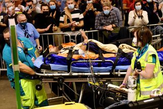 Mark Cavendish departs Ghent Six on a stretcher after a crash in final event