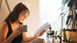 woman enjoying coffee in the morning