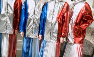 4 Models wore metallic red, white, blue jacket and skirt