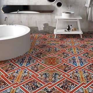bold patterned flooring in bathroom, white round tub, mirror