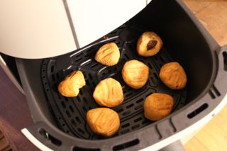 Finished donut holes in the Beautiful air fryer