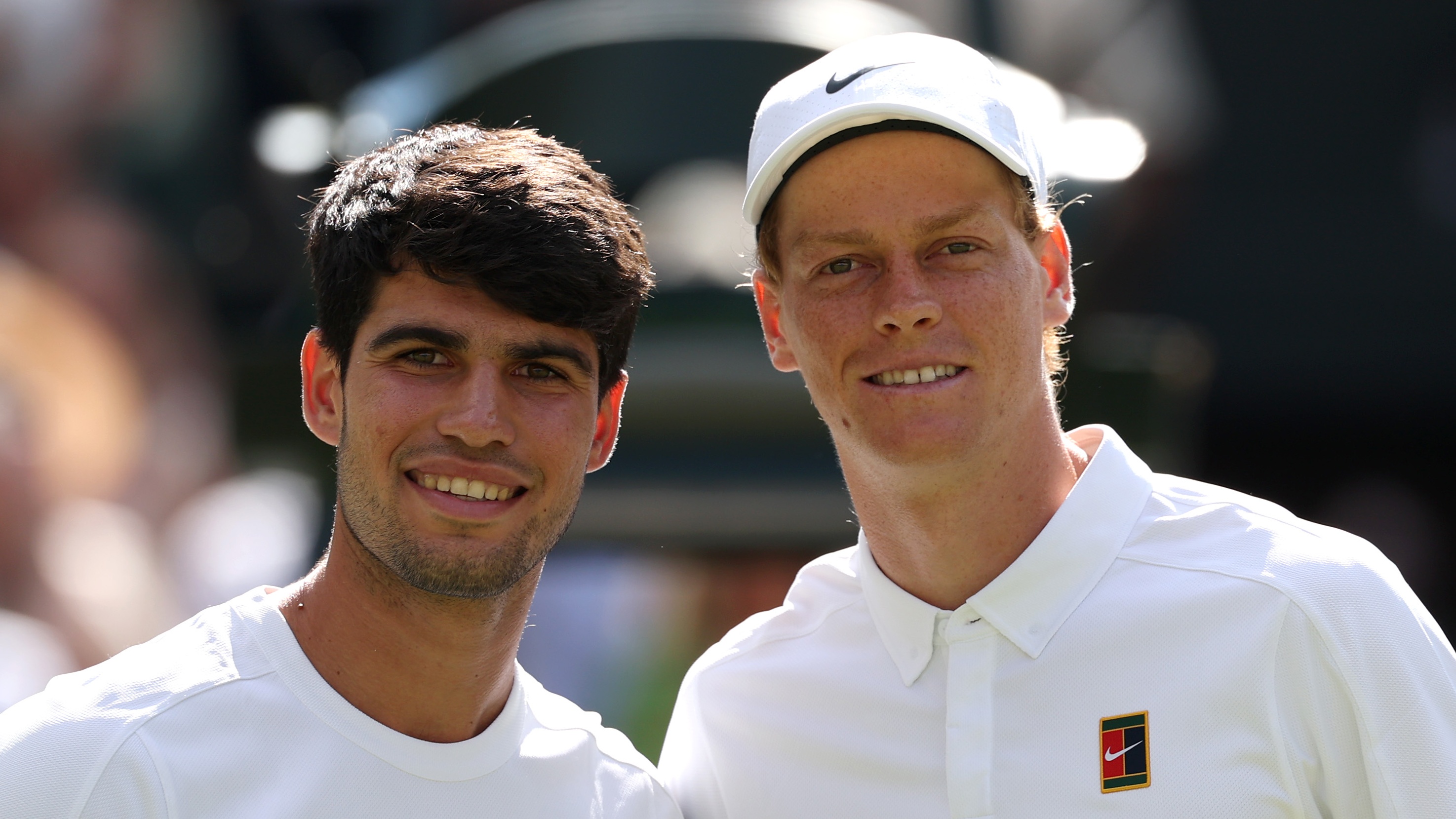 LONDON, ENGLAND - JULY 13: Carlos Alcaraz of Spain and Jannik Sinner of Italy pose for a photo at the net prior to the Gentleman's Singles Final on day fourteen of The Championships Wimbledon 2025 at All England Lawn Tennis and Croquet Club on July 13, 2025 in London, England. (Photo by Julian Finney/Getty Images)