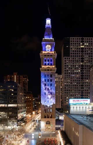 The Daniels and Fisher tower stands 325 feet tall in the center of the Theatre District, in the middle of the 16th Street Mall, just between lower and upper downtown.