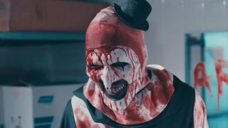 David Howard Thornton's Art the clown, looking horrific in Terrifier 2.