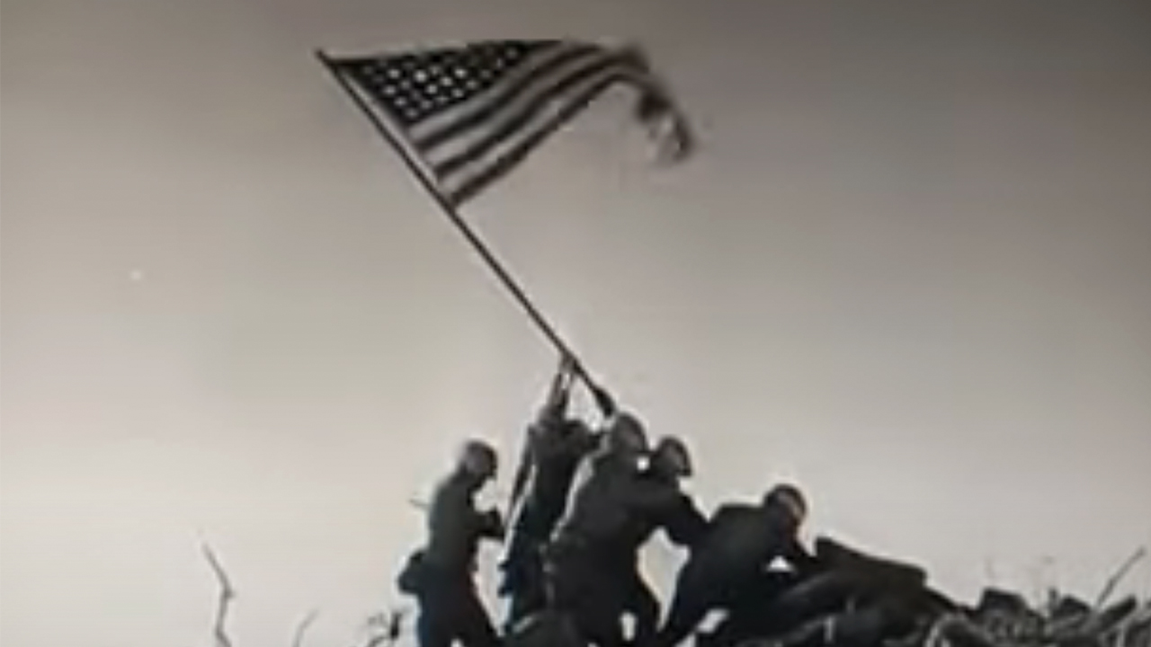 Soldiers hoisting the American flag in Sands of Iwo Jima