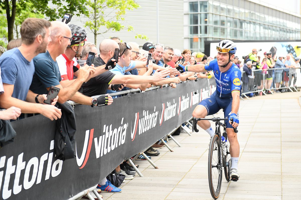 Picture by SWpix.com - 09/09/2021 - Cycling - AJ Bell Tour of Britain Stage 5 - Alderley Park to Warrington, England - Deceuninck Quick-Step rider Mark Cavendish greets the waiting fans