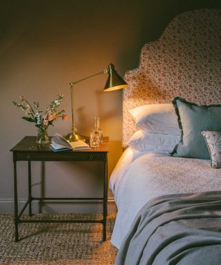 Chester Castle Headboard against a beige wall.