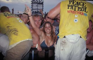 Front row concert fans at the main stage are shown at Woodstock 99 in Rome, New York on July 22, 1999. (Photo by Getty Images/John Atashian)