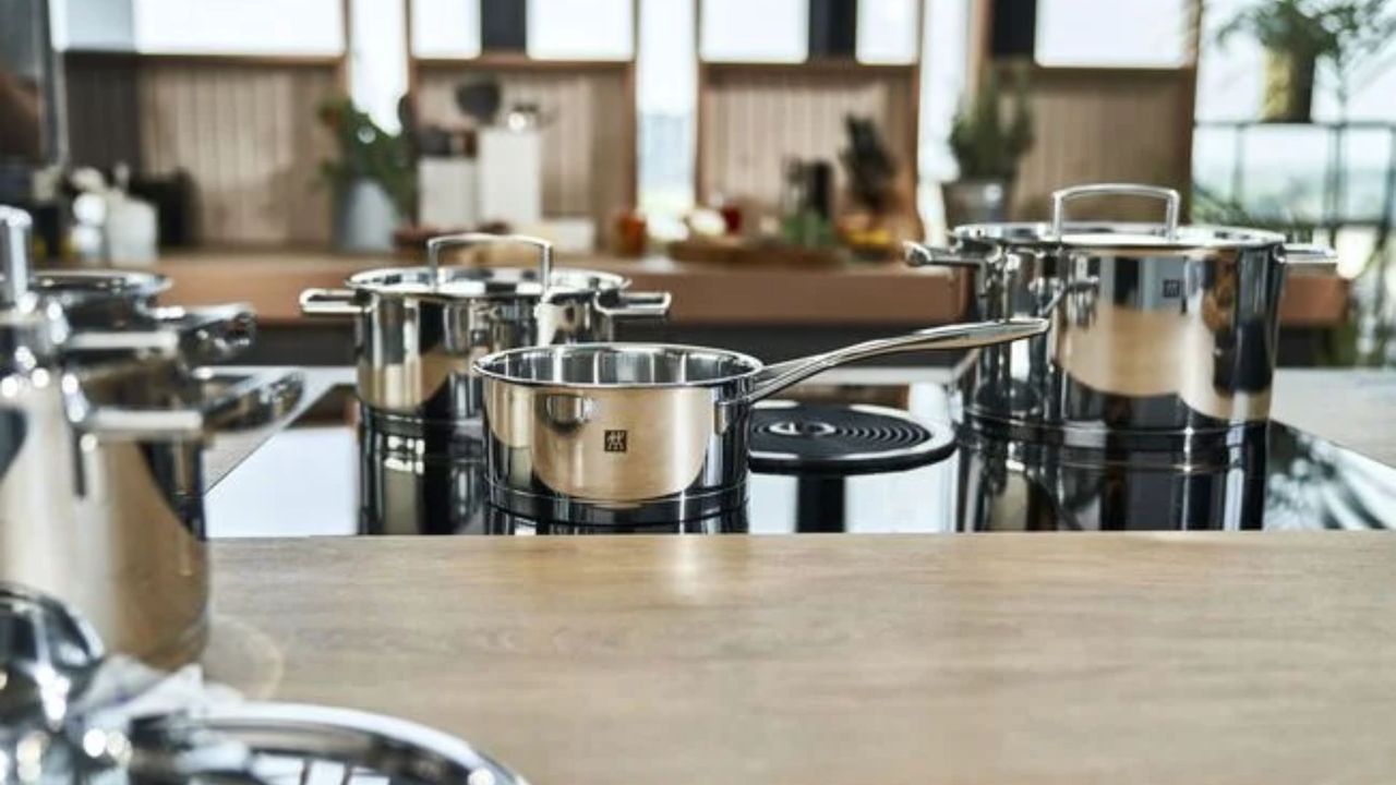 Zwilling Passion Stainless Steel Pot Set on an induction hob in an open plan kitchen