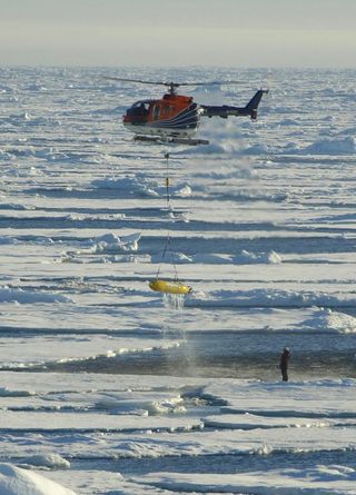 Recovery of the AUV with the helicopter.