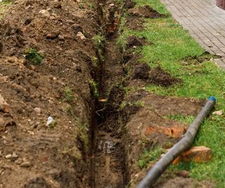 Drainage channel dug out with pipe