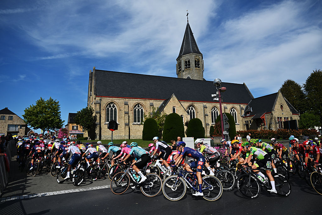 KOOLSKAMP, BELGIUM - SEPTEMBER 19: Tim Naberman of Netherlands and Team Picnic PostNL and a general view of the peloton competing during the 109th Kampioenschap van Vlaanderen 2025 a 180.2km one day race from Koolskamp to Koolskamp on September 19, 2025 in Koolskamp, Belgium. (Photo by Luc Claessen/Getty Images)