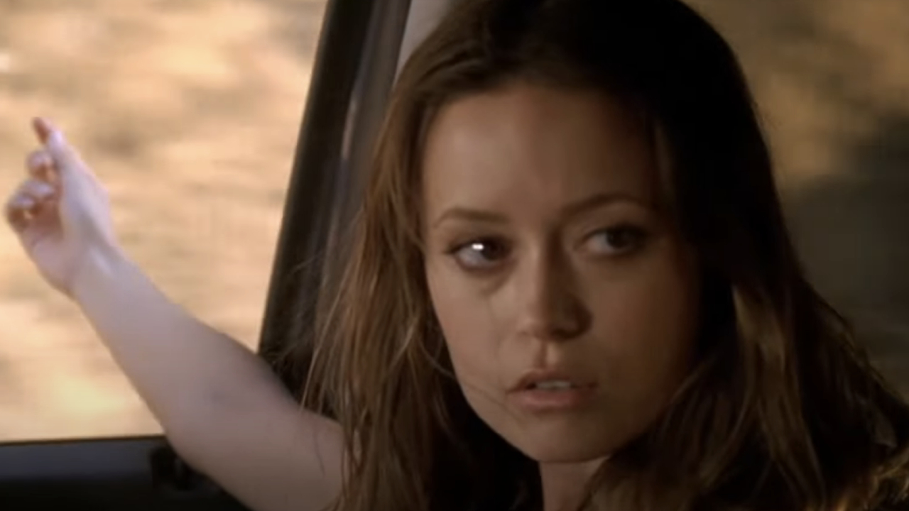 Summer Glau as Cameron holding her hand out a car window on Terminator: The Sarah Connor Chronicles