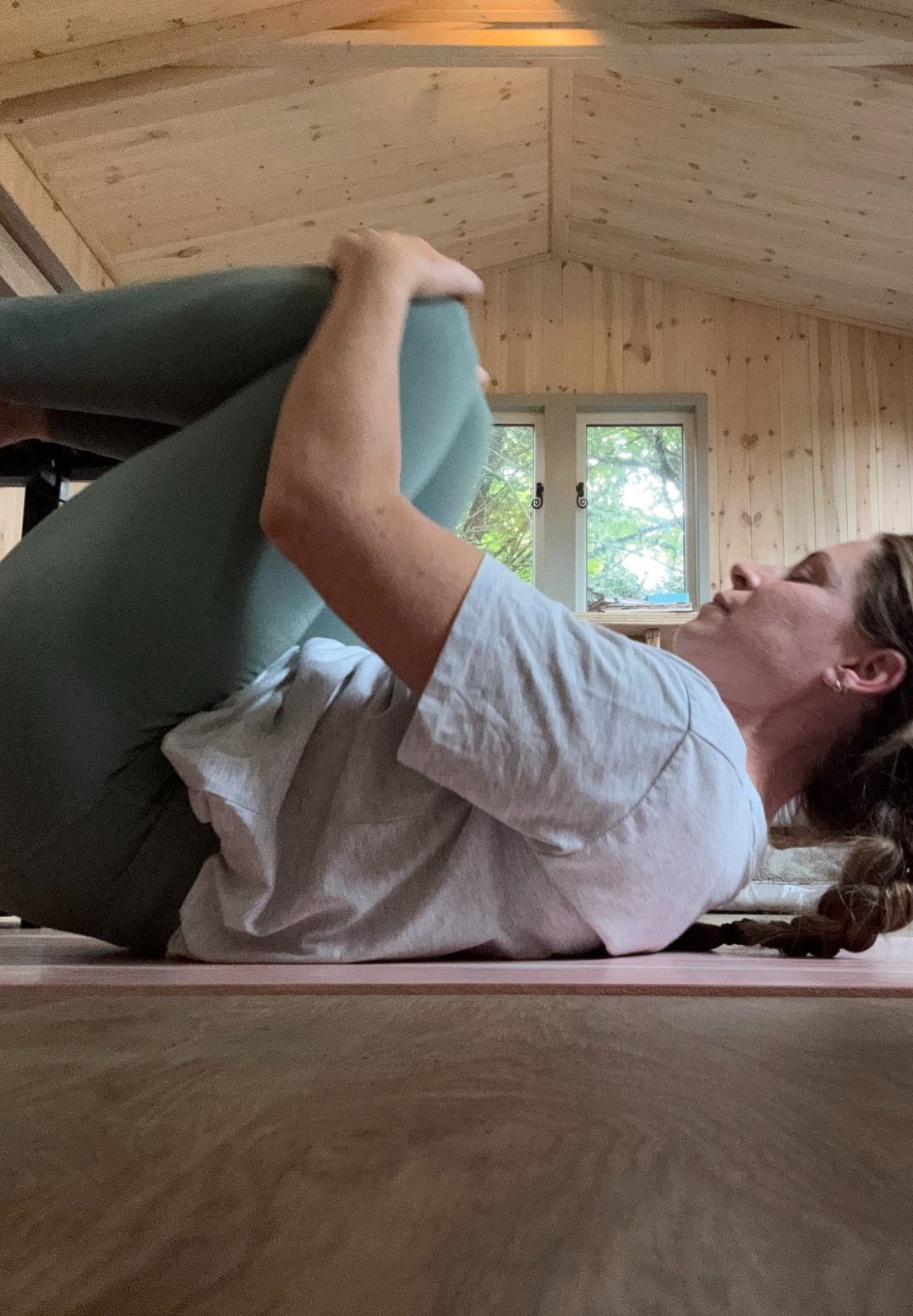 Health writer Anna Bartter trying the Pilates roll like a ball move every day for a week
