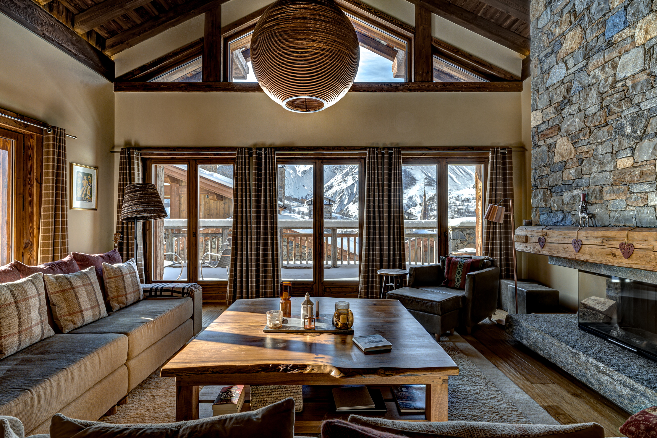 Images of the chalet in St Martin de belleville. lots of wood, lots of stone, lots of snow, lots of luxury