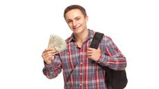 picture of college student holding money