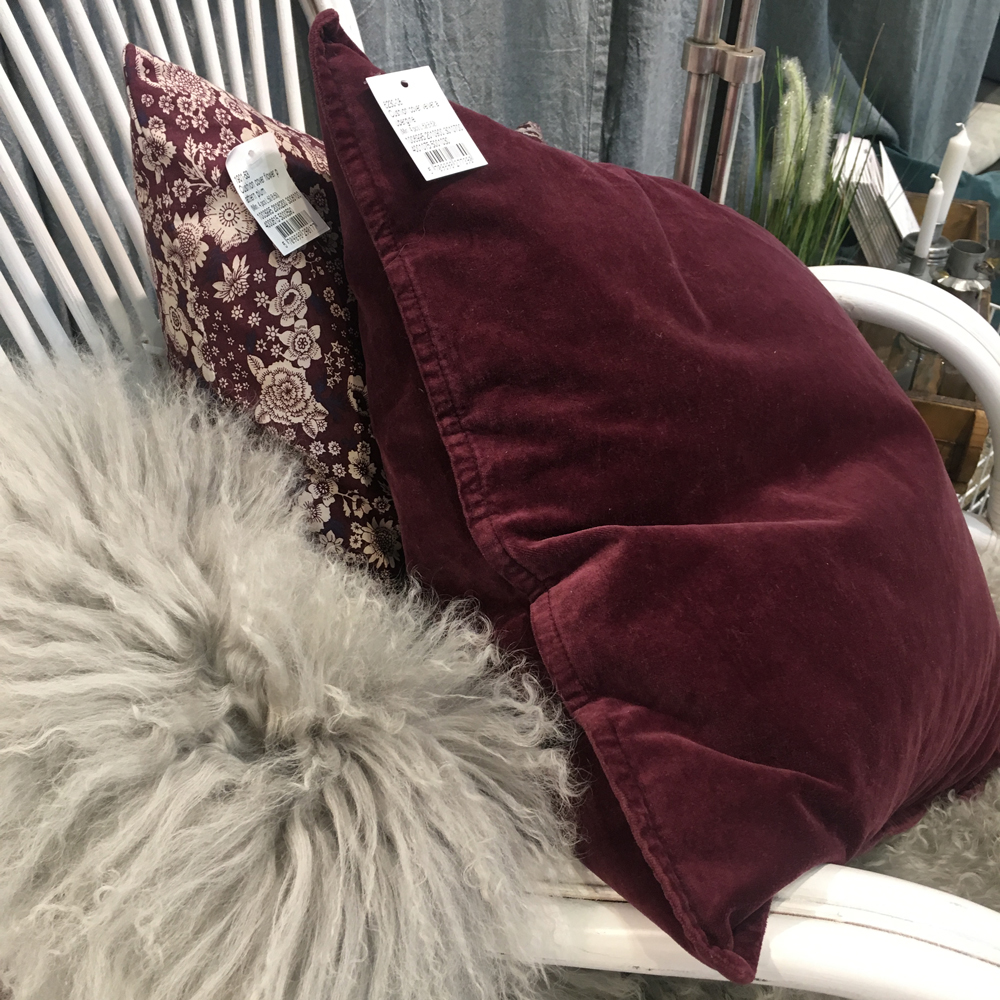 cushion with grey cloth and plant