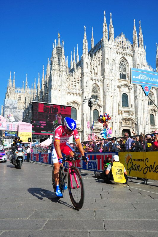 Michele Scarponi crosses the line in Milan thinking he woudl have to settle for second overall but the Italian would alter be declared the overall winner of the race