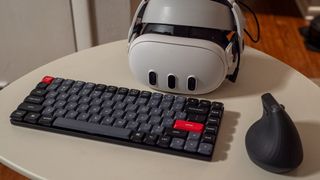 A Meta Quest 3 headset with a Bluetooth connected Keychron keyboard and Logitech MX Vertical mouse