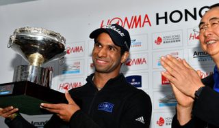 Aaron Rai holds up the 2018 Hong Kong Open