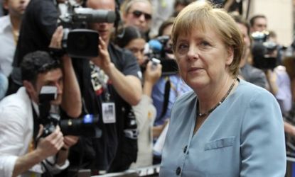 German Chancellor Angela Merkel arrives at an informal EU leaders summit in Brussels Wednesday: Saving Greece and keeping it in the EU may all come down to Germany.