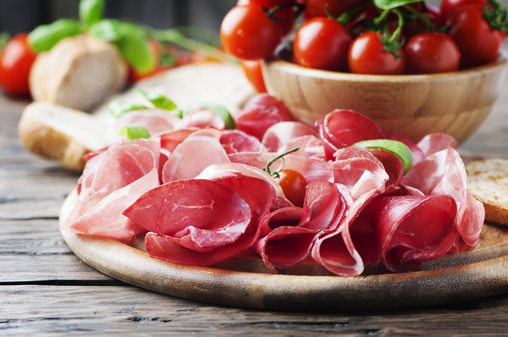 Antipasto with ham and bresaola, selective focus