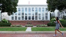 A person walks on the campus of Northeastern University in Boston.