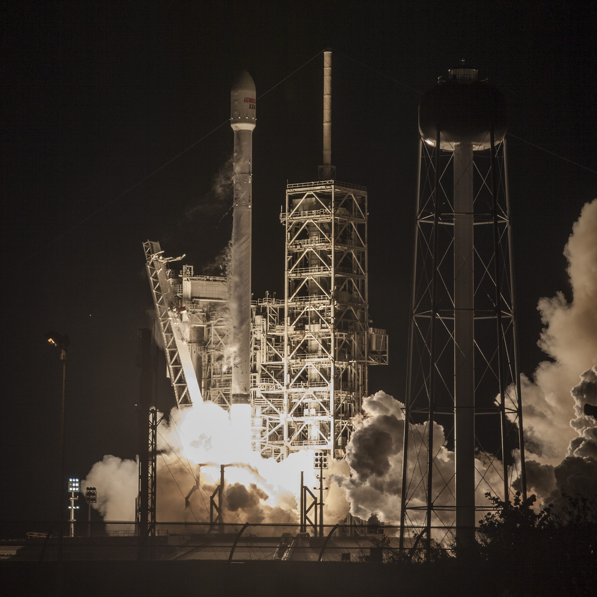 The SpaceX Falcon 9 rocket lifts off from Pad 39A at NASA's Kennedy Space Center in Florida to send the EchoStar 23 satellite into orbit. The was expected to be SpaceX's last flight that would throw away the Falcon 9 first stage.