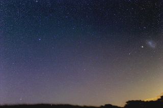 Astrophotographer Justin Tilbrook of Penwortham, South Australia, caught this photo of Comets Lemmon (bottom left) and Pan-STARRS (right near the Small Magellanic Cloud) together on Feb. 17. 2013. He writes: "This is the one I've been waiting for…. Don't mind saying it was difficult to set this up, a narrow window before sunrise, 4 degrees of hill in the way, limitations with the dome slit and having to mount the camera at the front of the scope at a very odd angle. Took about an hour."