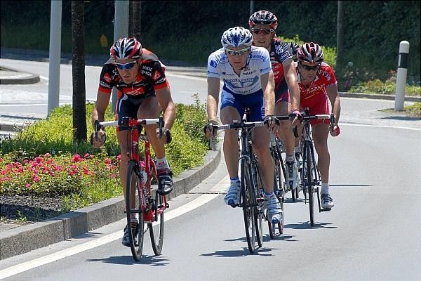 The escape with Francisco P&eacute;rez (Caisse d'Epargne), Ren&eacute; Weissinger (Team Volksbank), Maarten Tjallingii (Silence-Lotto) and Herv&eacute; Duclos-Lassalle (Cofidis).